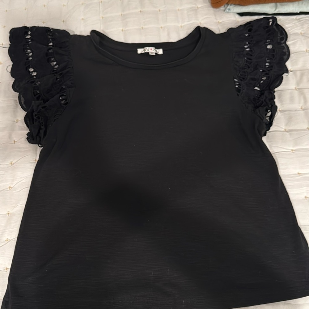 Black top with lace flutter sleeves. Size L